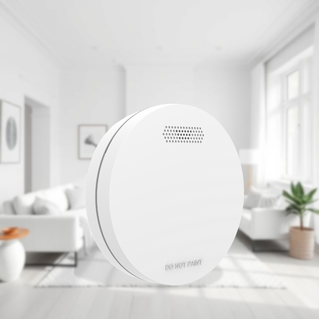 ZEN wireless smoke alarms in a white lounge room background